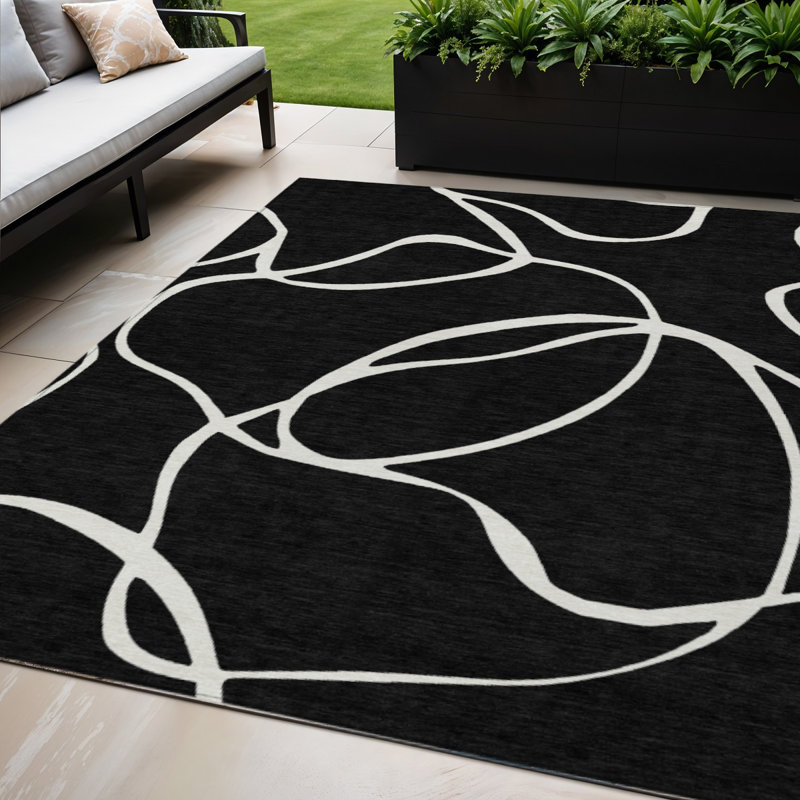 5' X 8' Black And Ivory Abstract Washable Indoor Outdoor Area Rug