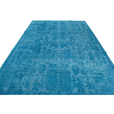 Tapis bleu Kalmanovitz