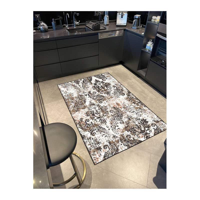 Tapis tissé à motif floral traditionnel avec base lavable