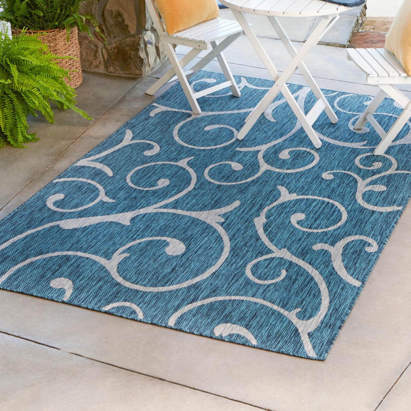 Tapis intérieur / extérieur bleu sarcelle en polypropylène tissé à la machine, Rectangle 7 pi 1 po x 10 pi