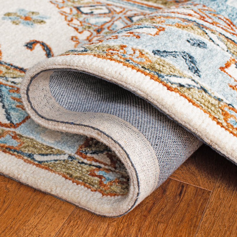 Donney Hand Tufted Wool Southwestern Rug, Rectangle 5' x 8'