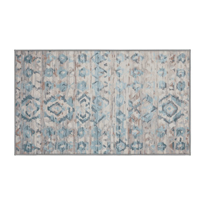 Tapis gris lavable à la machine