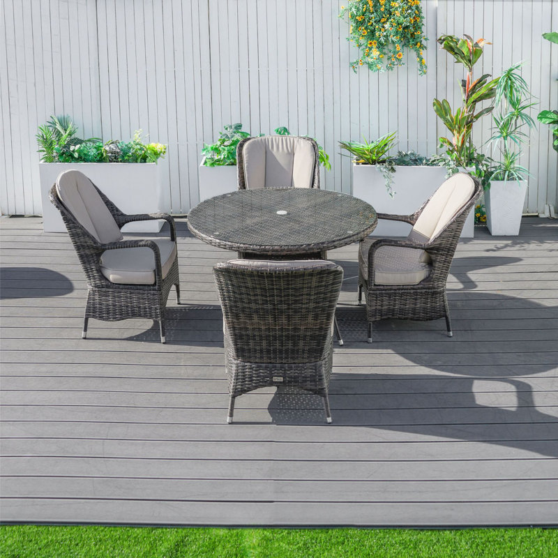 4 - Person Patio Dining Set with Oval Table , Cushions Included, Brown/Beige