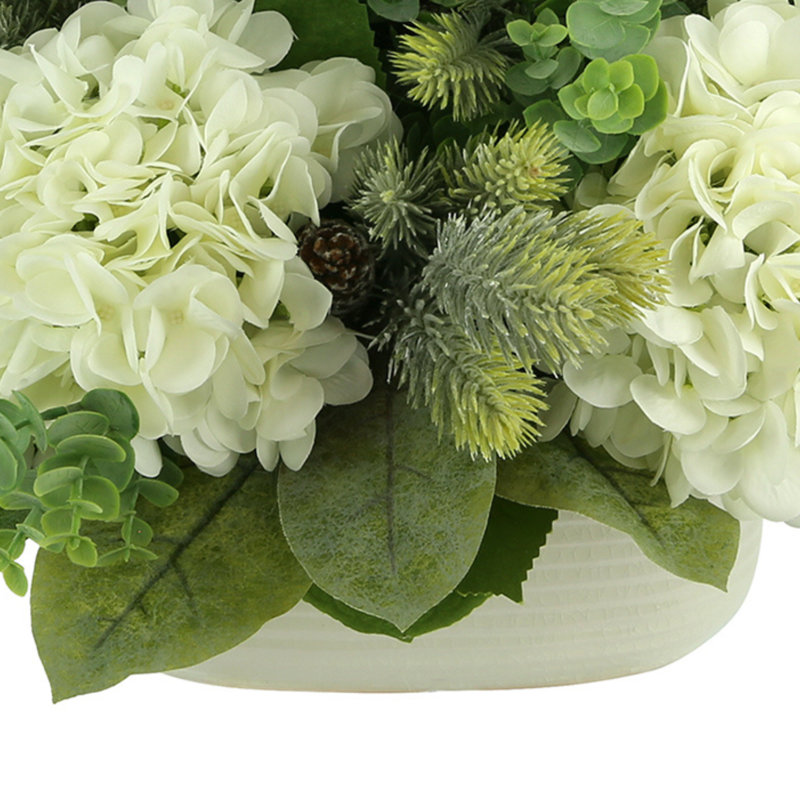 Hydrangea, Eucalyptus And Evergreen Holiday Arrangement In A Ceramic Pot