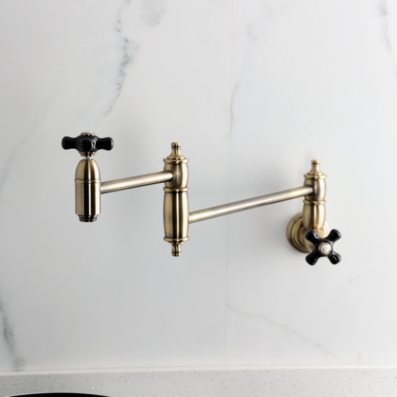 Kingston Brass Duchess Two-Handle 1-Hole Wall Mount Pot Filler Faucet, Antique Brass