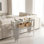 Luxueuse table de vestibule avec une tablette en verre double, table de vestibule ovale moderne, idéale pour les couloirs et les salons, structure en acier inoxydable poli.