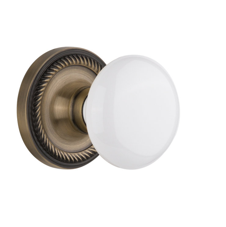 Rosette corde avec bouton de porte en porcelaine blanche, Laiton antique, 2 3/4 po