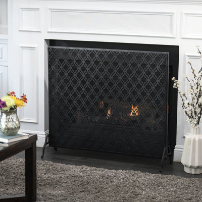 Pare-feu moderne en fer forgé à panneau unique, couleur noire, motif de cercles superposés, profondeur 97,5 cm, largeur 27,8 cm, hauteur 86,5 cm, retient les braises, instructions de montage disponibles, pare-feu avec finition.