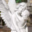Statue enfant ange étreignant