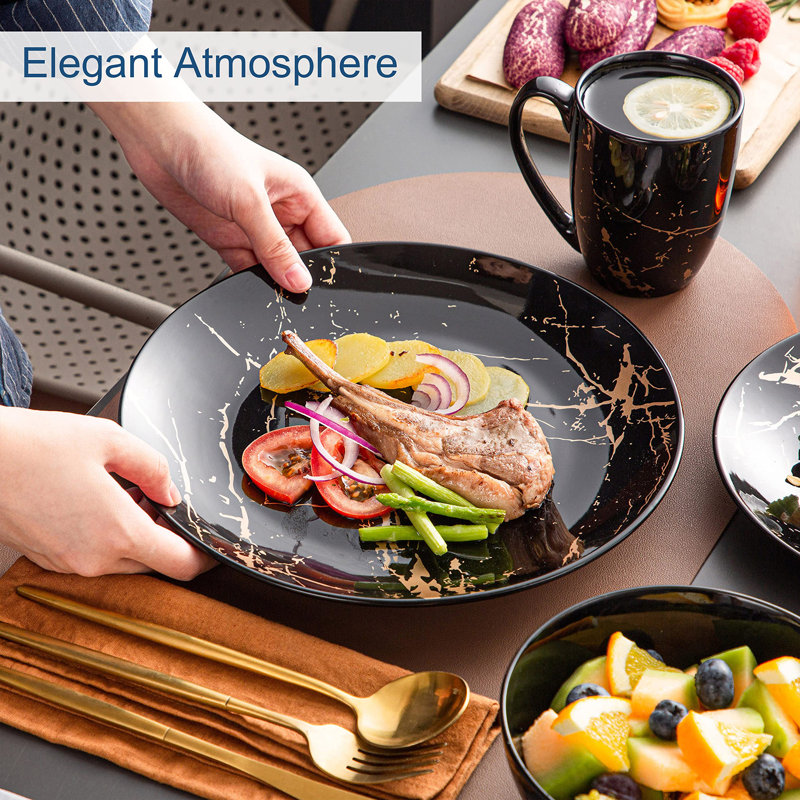 Black and Gold Splash Porcelain 16-Piece Dinnerware Set