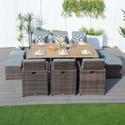 Daoudiate 6 - Person Wicker Patio Dining Set with Rectangular Table , Cushions Included