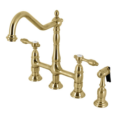 Kingston Brass Tudor Two-Handle 4-Hole Deck Mount Bridge Kitchen Faucet with Brass Side Sprayer