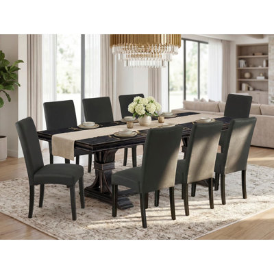 9-piece kitchen table set consists of a rectangular table and 8 Black Linen Fabric dining chairs with Padded Chair Back - Sand Blasting Black Finish.