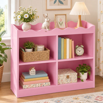 4 wooden storage cubes with scalloped edges are arranged over 3 tiers in this pink, 32" wide low horizontal organizer for bedrooms, living rooms, or home offices.