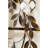 Metal Faux Wreath On Window Frame
