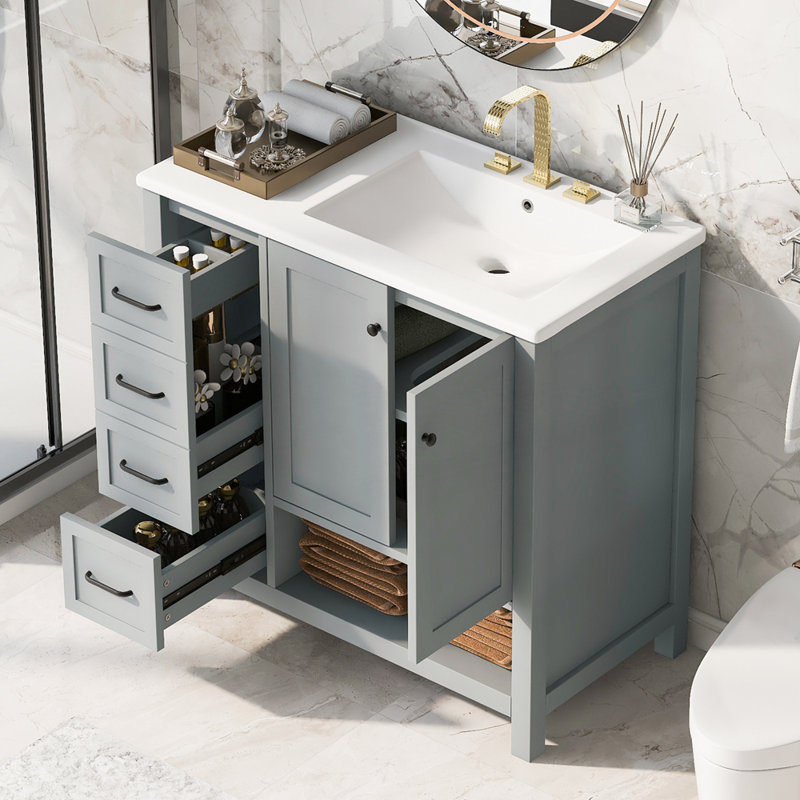 Meuble-lavabo durable avec lavabo en céramique et rangement spacieux, idéal pour les salles de bain modernes et fonctionnelles.