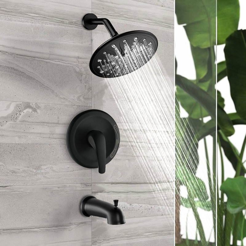 Douche noire mate avec poignée unique. Comprend une pomme de douche à effet pluie, une douchette à main, un bec de baignoire et une vanne. Débit de 1,8 gpm. Résistante à la corrosion et aux rayures. Poignée murale élégante. Inclus : et . 360