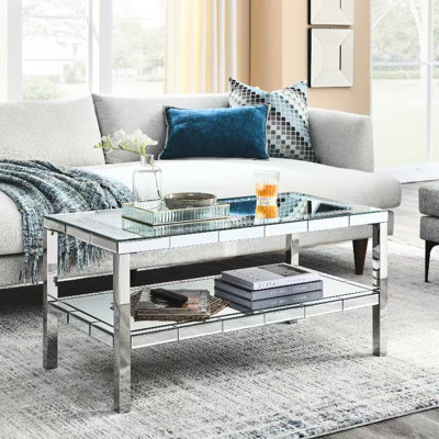 Table basse à miroir de conception moderne pour les bureaux, les magasins et les chambres à coucher. Structure en acier inoxydable à 2 couches pour bureau, magasin, salon et chambre à coucher. Avec pieds. Assemblage et nettoyage faciles. Finition brillante.
