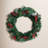 Artificial 24" LED Mixed Pine Christmas Wreath with Flocking, Pinecones and Berries, Green