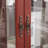 Dyisha Cherry 2-Door Lighted Curio Cabinet w/ Glass Doors, Mirrored Back, Adjustable Shelves-175737268