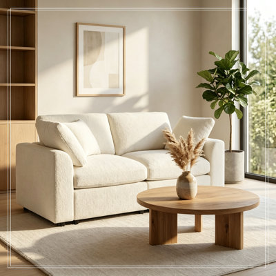 Causeuse en chenille avec structure en bois et coussin décoratif