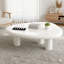 Modern Triangular Cream-White Low Coffee Table with a Three-Leg Design, Suitable for Living Rooms