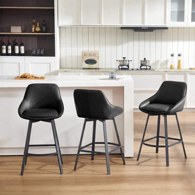 Janayshia Modern Industrial Swivel Upholstered 25.6'' Faux Leather Counter Stool with Metal Frame