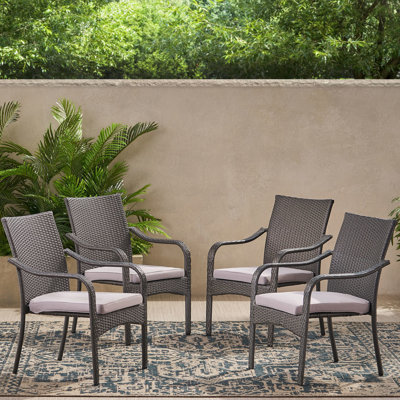 Outdoor Patio Stacking Arm Chairs In Grey Pe , Iron Frame, Silver Cushions, Ergonomic And For Seating Of 4 Use