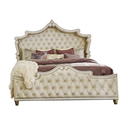 Duxbury Upholstered Wingback Bed
