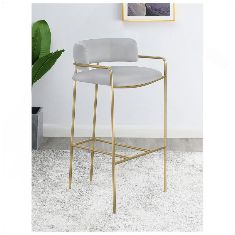 Tabouret à dossier bas gris et or avec revêtement en velours et structure en métal mince, parfait pour les intérieurs modernes et Mid-Century.