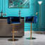 Lot de 2 tabourets de bar en velours bleu marine, pieds, repose-pieds et base dorés, hauteur réglable. Revêtement inclus.