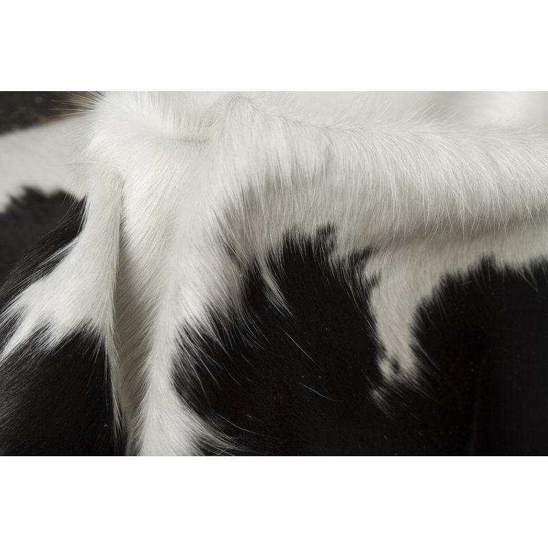 Tapis blanc / noir en peau de vache Barlow