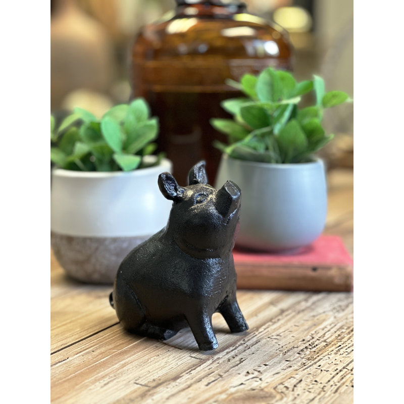 Cochon en fonte, tête haute