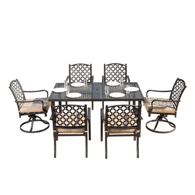 Ensemble repas 7 pièces en métal avec chaises pivotantes et coussins Nasir