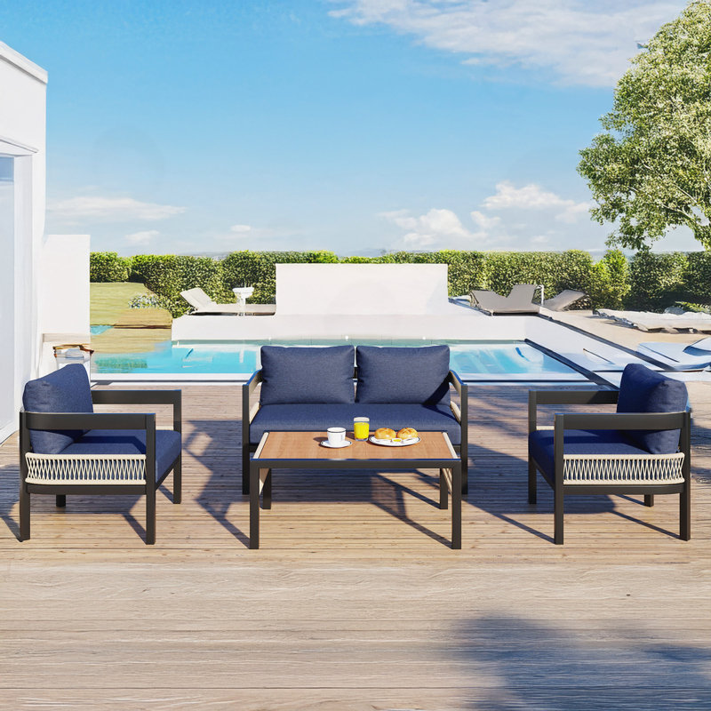 Canapé d'extérieur moderne en fer avec accents élégants en rotin et table assortie, Bleu foncé