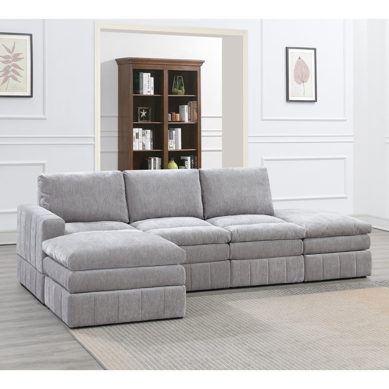Canapé modulaire 5 pièces gris en suède gris pour un salon moderne avec coussins et pièces en tissu