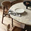 Brisa Round Stone Dining Table