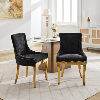 Chaises de salle à manger en chenille noire dans un style moderne, de 2 avec mousse et ressorts de haute qualité, élégantes garnitures courbées dorées pour une ambiance luxueuse