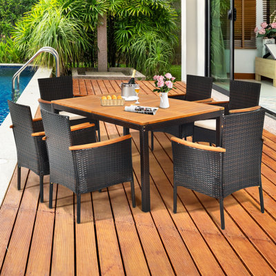 Nadkar Rectangular 6 - Person 59" Long Dining Set with Cushions