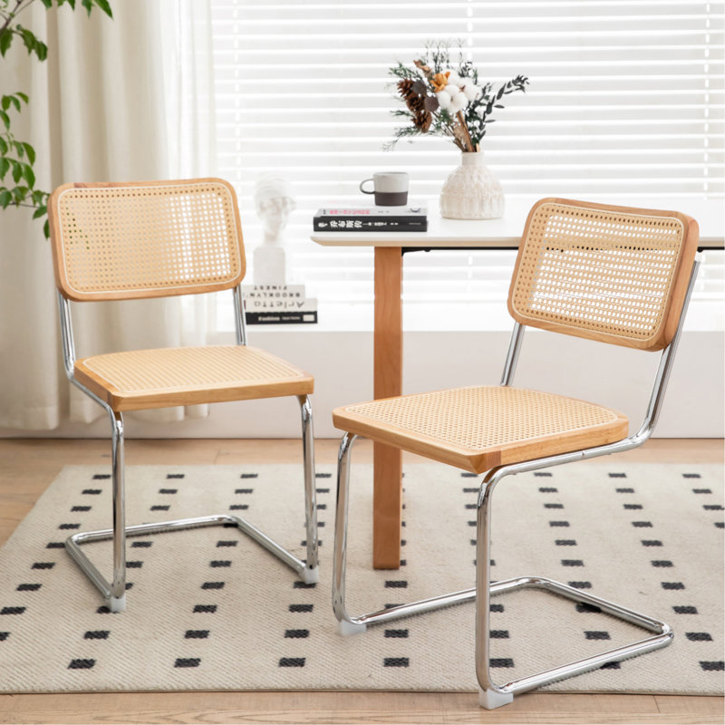 Ensemble de 2 chaises de salle à manger élégantes en velours avec pieds chromés, idéales pour les espaces modernes et contemporains.