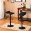 De 2 tabourets de bar réglables en cuir reconstitué noir - style moderne et fonctionnalité pivotante 2 hauteur de base pour la durabilité