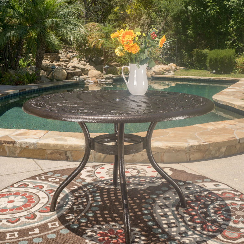 48-Inch Round Outdoor Dining Table Crafted Of Cast Aluminum In Hammered Bronze, With Tabletop, Umbrella Hole, And Curved Legs, For Entertaining 48-In Bronze Finish, Relaxing
