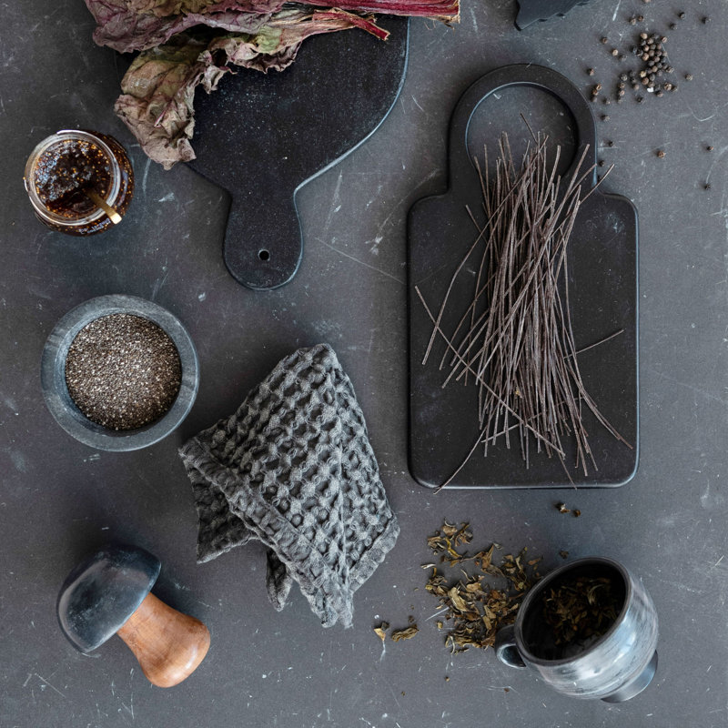 Black Mango Wood Cutting Board with Round Handle