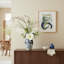 Magnolia and Delphinium Arrangement in a Decorative Ceramic Vase