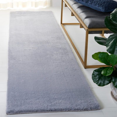 Tapis de performance en fausse fourrure de lapin Chinda
