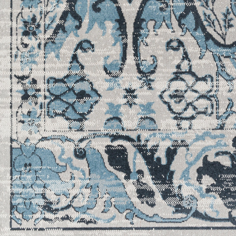 Ember Swirling Majestic Blue Synthetic 6'7" x 9' Rug