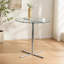 Table de bar ronde en verre avec base chromée pour petits espaces