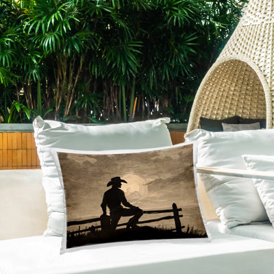 Sunset Cowboy Fence Silhouette Outdoor Printed Pillow design by Kim Allen