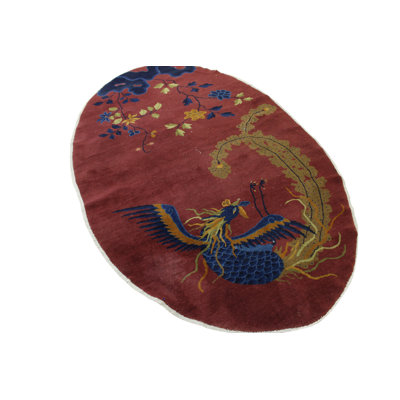 Tapis ovale rouge Rauni