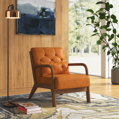 Alcie 25.79" W Tufted Faux Leather Upholstered Armchair with Wooden Armrests & Legs and Pillow by Wade Logan
